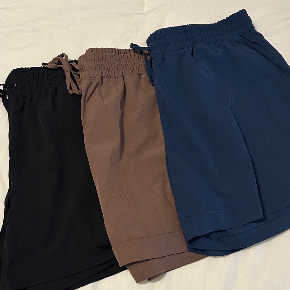 Women’s lot of 3 Mondetta Elastic Waist cuffed Shorts Black, Brown, blue size XL
